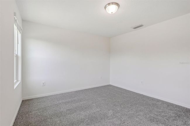 16419 Bird Of Paradise Ave, Townhouse with 3 bedrooms, 3 bathrooms and null parking in CLERMONT FL | Image 29