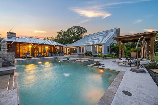 View of Pool and Spa, Outdoor Living Center and Rest of Home | Image 4