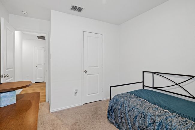 Bedroom with baseboards, carpet floors, and visible vents | Image 18