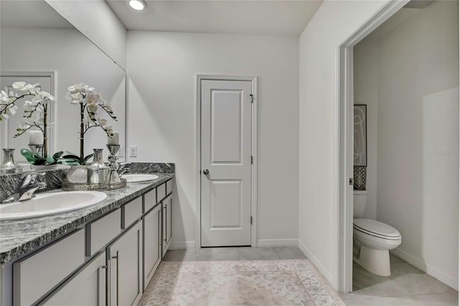 9188 Forge Breeze Loop, House other with 4 bedrooms, 3 bathrooms and null parking in WESLEY CHAPEL FL | Image 14