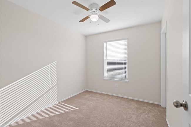 Secondary bedroom #3 with walk in closet. | Image 25