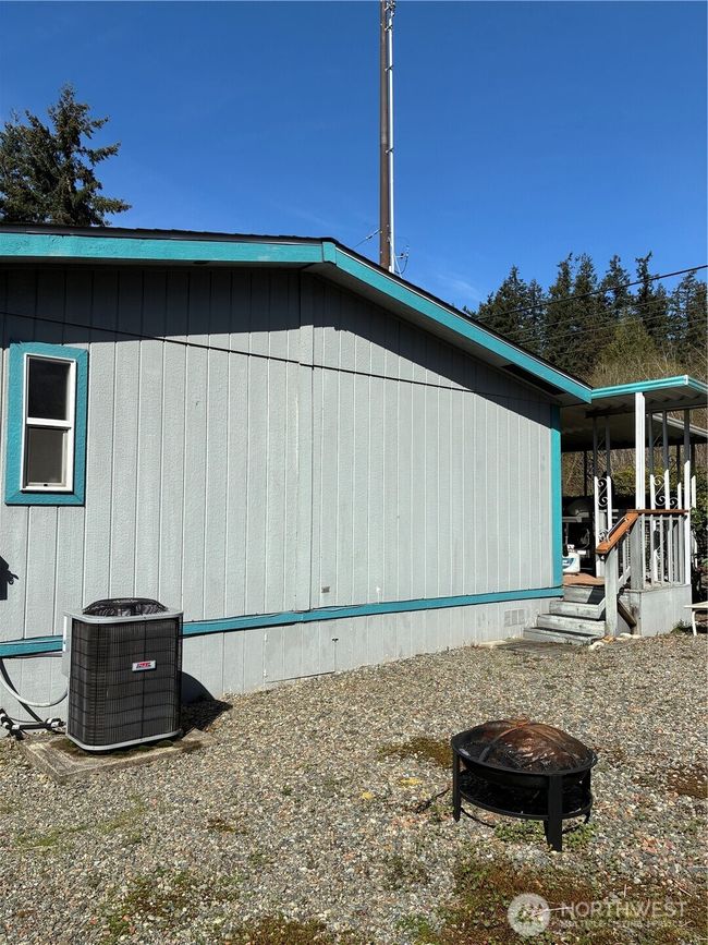 Side with Heat Pump and Fire Pit | Image 8