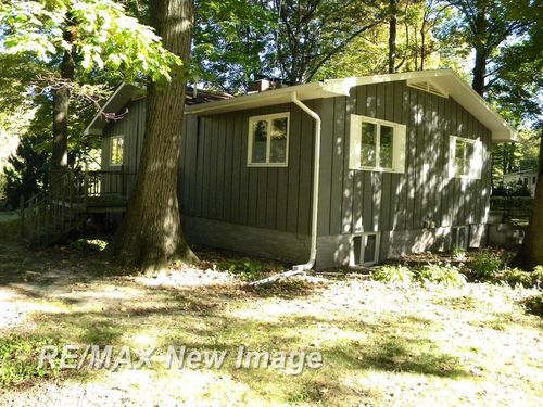 667 E Whitethorn Dr, Midland, MI, 48640-8626 | Card Image