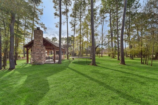 27603 Siandra Creek Ln, House other with 5 bedrooms, 5 bathrooms and 3 parking in Spring TX | Image 45