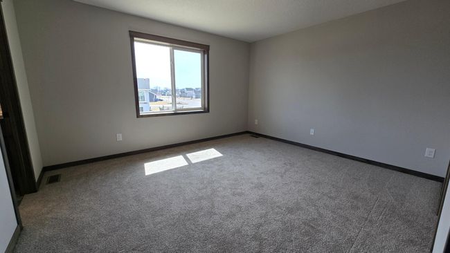 The primary bedroom on the upper level. | Image 17