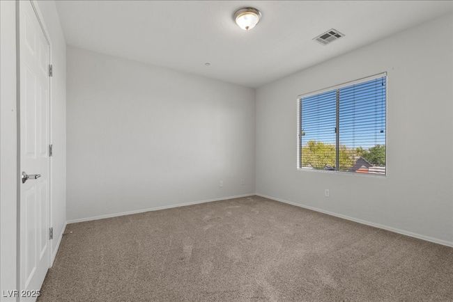 Spare room with carpet and baseboards | Image 22