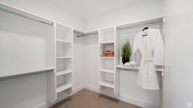 Spacious closet with carpet floors | Image 23