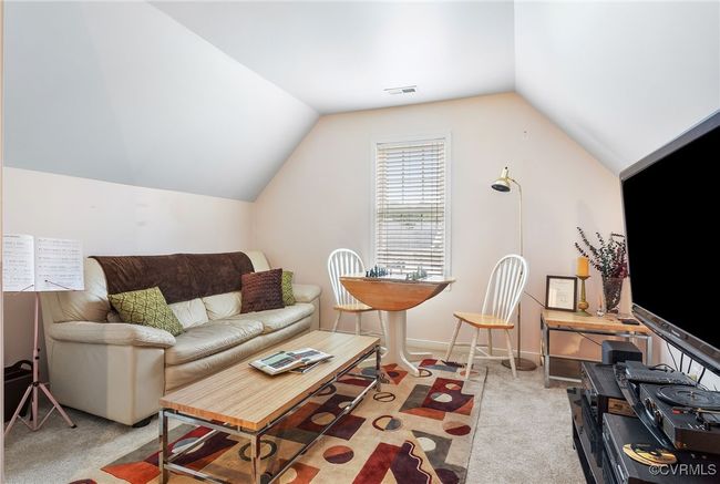 Bedroom #3, or rec room. 2nd floor, half bathroom attached. Large walk-in attic storage space also found upstairs. | Image 23