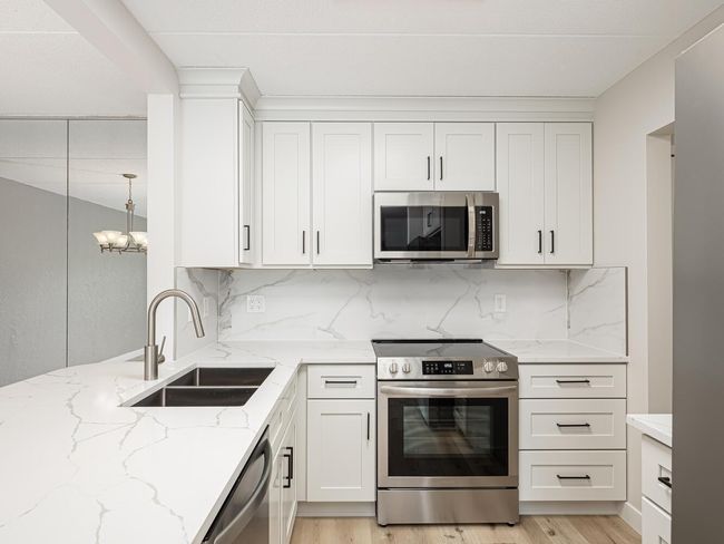 10411 Cedar Lk Rd S Apt 411-large-007-004-Kitchen-1334x1000-72dpi.jpg | Image 4