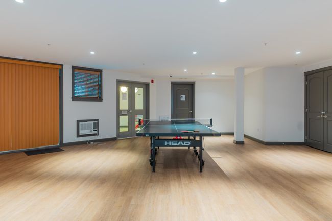 Playroom featuring recessed lighting, baseboards, light wood-style flooring, and heating unit | Image 35