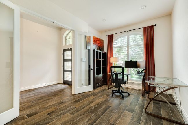 Spacious office with double glass doors and lots of natural light. | Image 4