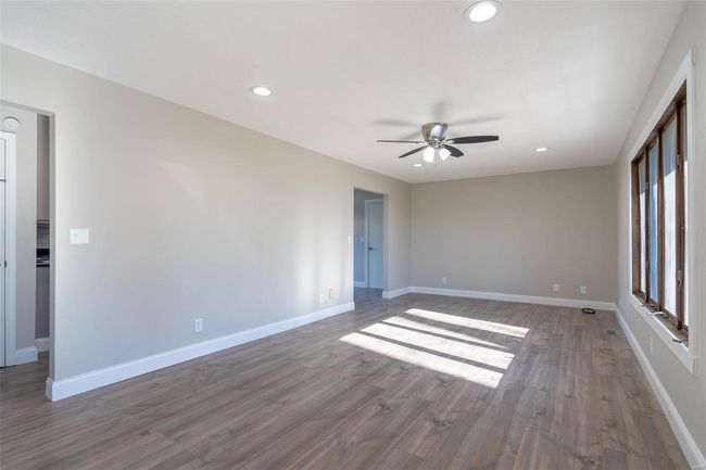 Empty room featuring wood-style flooring and ceiling fan | Image 29