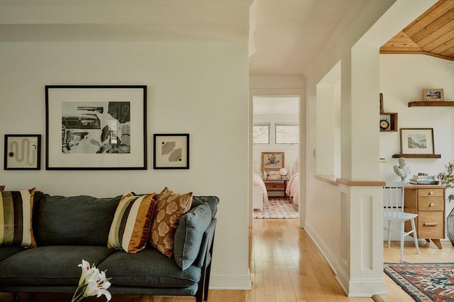 Living room with light wood-style flooring and wooden ceiling | Image 14