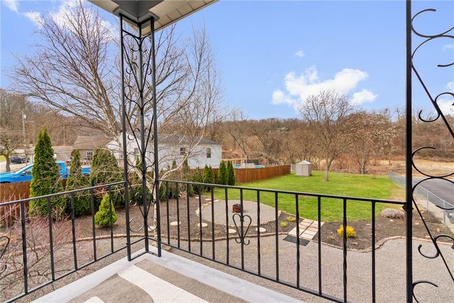 Rear balcony overlooking the back yard | Image 7