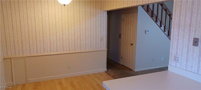 Spare room with hardwood / wood-style flooring | Image 3