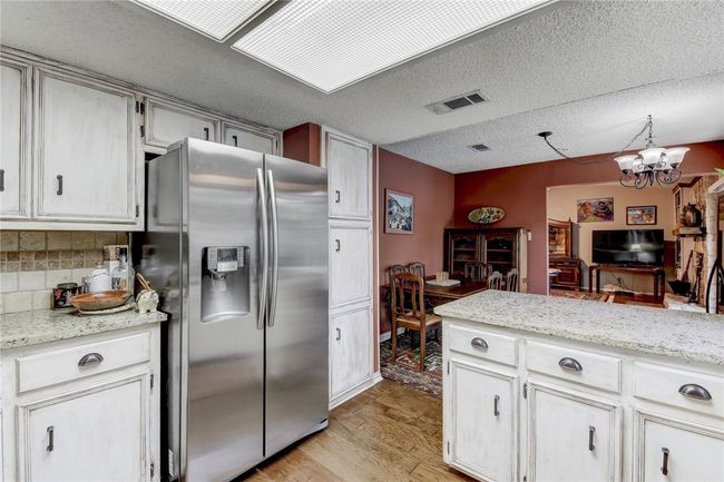 9001 Bubbling Springs Trl, House other with 4 bedrooms, 2 bathrooms and 4 parking in Austin TX | Image 9