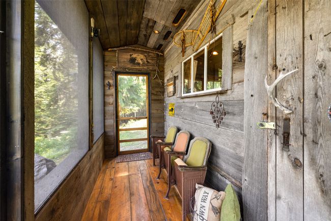 Cabin Studio Sunroom featuring lofted ceiling | Image 46