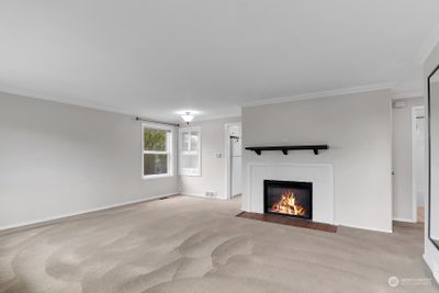 Immaculate home with large living room with electric fireplace (can be converted to wood) | Image 3