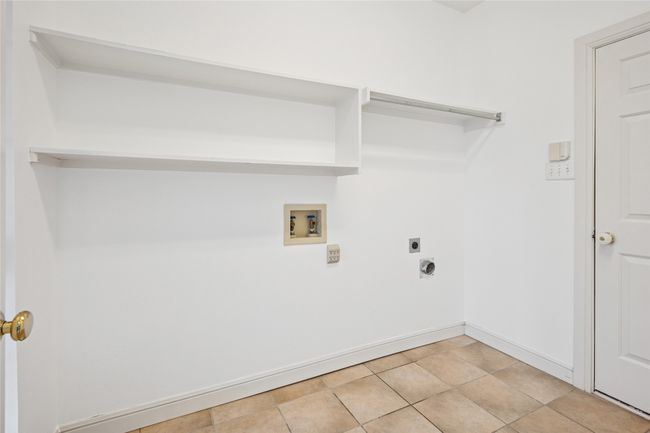 Utility room located downstairs with room for 1freezer | Image 36