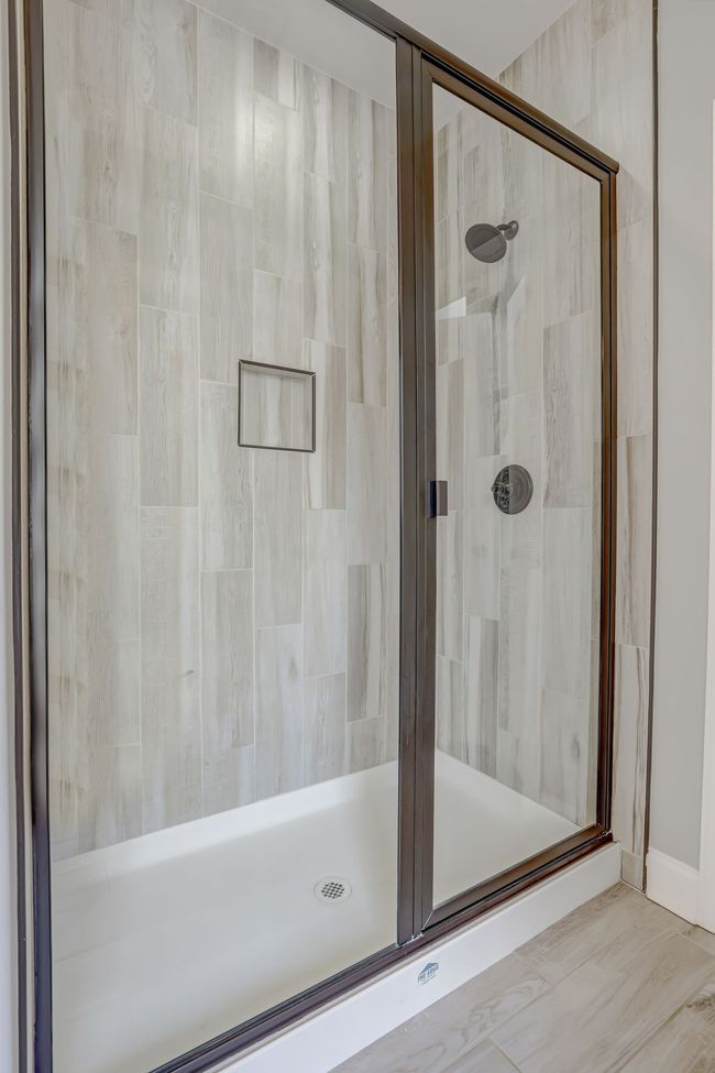 Beautiful tile walk-in shower | Image 15
