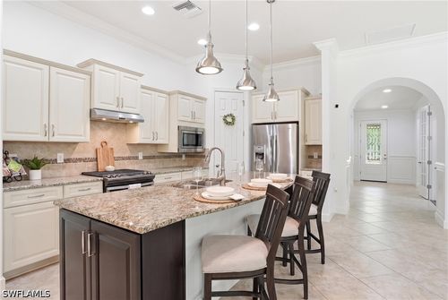 9436 Whooping Crane Way, NAPLES, FL, 34120-1857 | Card Image
