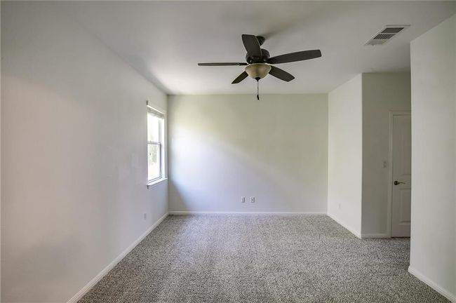 Empty room featuring carpet and a ceiling fan | Image 29