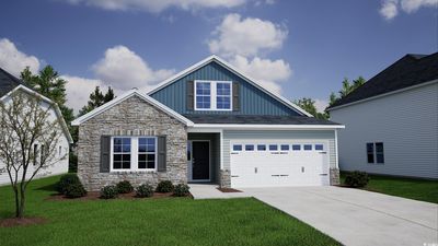 Craftsman-style home with a garage and a front yard | Image 1