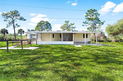 233 Azalea Ln, OSTEEN, FL, 32764-9547 | Card Image