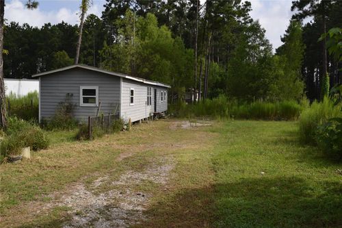 91 County Road 5001, Cleveland, TX, 77327-1136 | Card Image