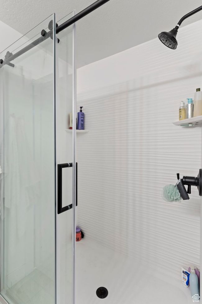 Bathroom featuring a stall shower | Image 21