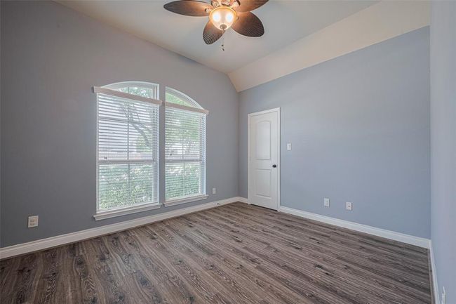 Second Guest Bedroom in the front of the home. | Image 7