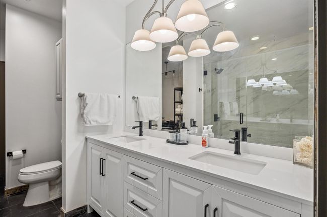 A beautifully designed bathroom with modern fixtures and a clean, fresh feel. | Image 26