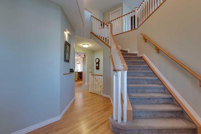 144 Westland Street, Home with 4 bedrooms, 3 bathrooms and 4 parking in Okotoks AB | Image 2