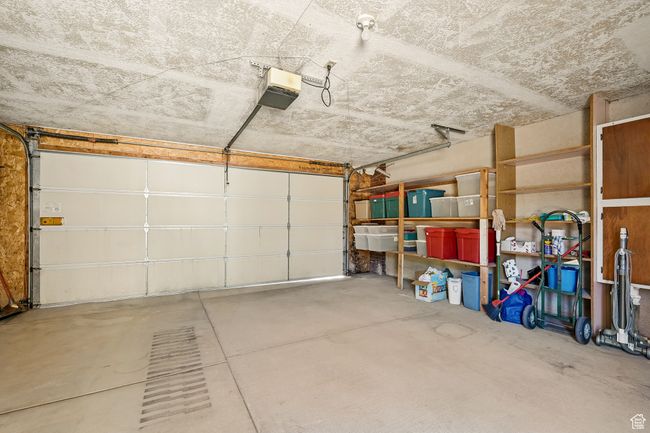 Garage with a garage door opener | Image 40