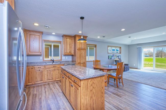 Kitchen with center island | Image 8