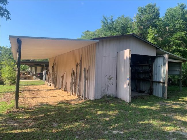 24645 Ne 177 Th Ter, House other with 2 bedrooms, 1 bathrooms and null parking in Fort Mc Coy FL | Image 45