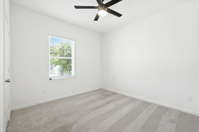 Empty room featuring carpet floors and a ceiling fan | Image 18