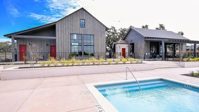 Community pool with a patio | Image 5