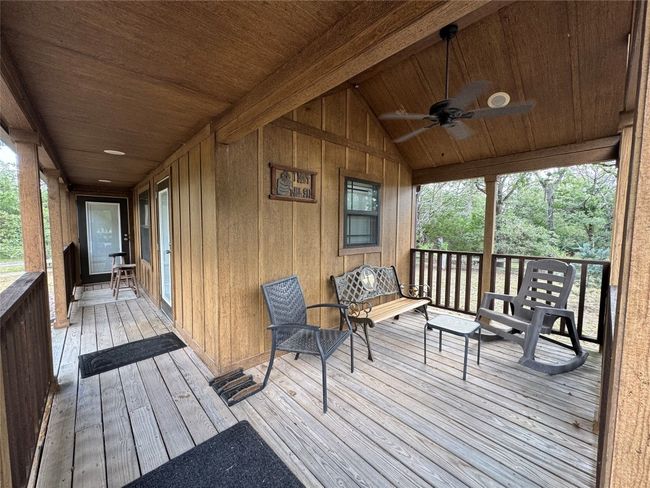 Wooden deck featuring ceiling fan | Image 26