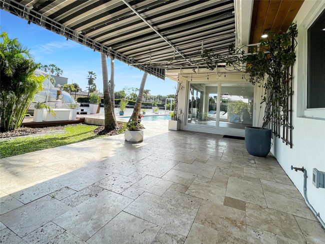 Covered patio off living and primary bedroom | Image 15