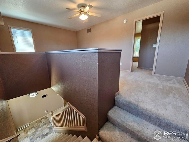 Upstairs bonus space with bedroom and 3/4 bath | Image 25