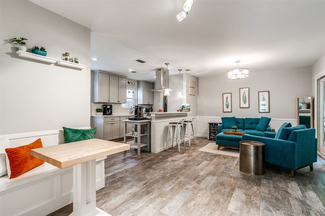 Living room with wood finished floors | Image 14