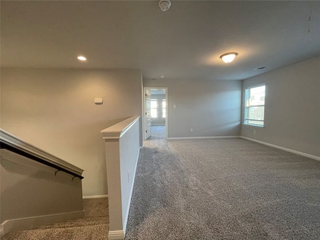 Stairway with carpet floors and recessed lighting | Image 13