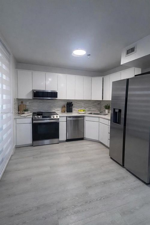 219-e-671 Ne 195th St, Miami, FL, 33179-3340 | Card Image