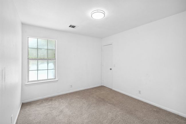 Unfurnished room with baseboards, visible vents, and carpet | Image 25