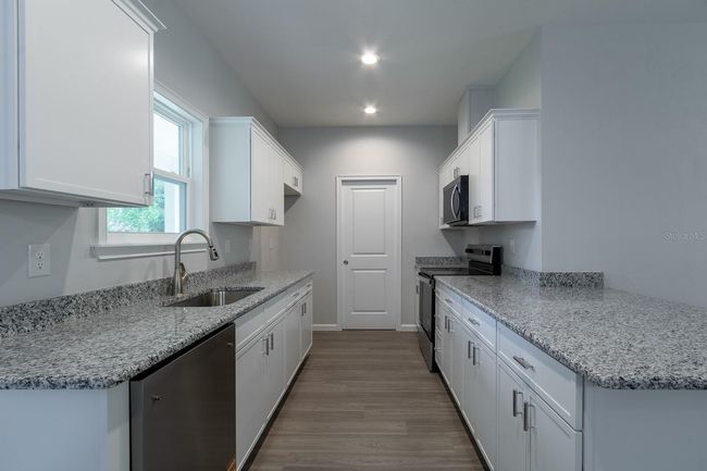 7544 Se 78 Th Pl, House other with 3 bedrooms, 2 bathrooms and null parking in TRENTON FL | Image 10