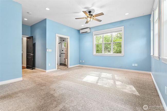There is another ductless heating/cooling unit in this space, so the secondary living space has its own separate heating and cooling capability. Pretty awesome! | Image 28