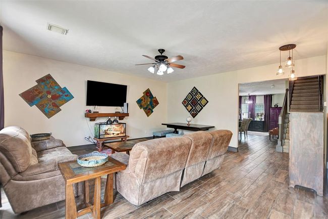 Looking through the family room towards the formals | Image 13