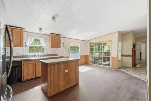 910 County Road 3556, Cleveland, TX, 77327-1940 | Card Image