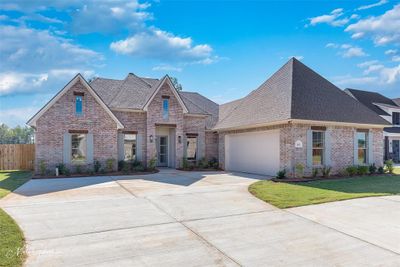 View of front of home featuring a garage | Image 1